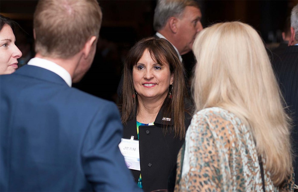 Bellwether League Inc. Board Member Jean Sargent (center) with Gold Sponsor GHX’s Karen Conway (right, back to camera) and Corporate Sponsor MedSpeed’s Jake Crampton (left, back to camera).