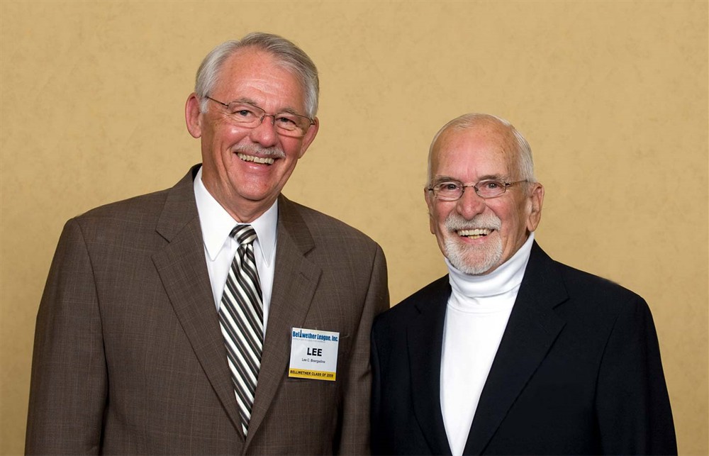 Bellwether League Inc. Board Member Vance B. Moore (left) joshes with Larry Malcolmson (Bellwether Class of 2011) (right).