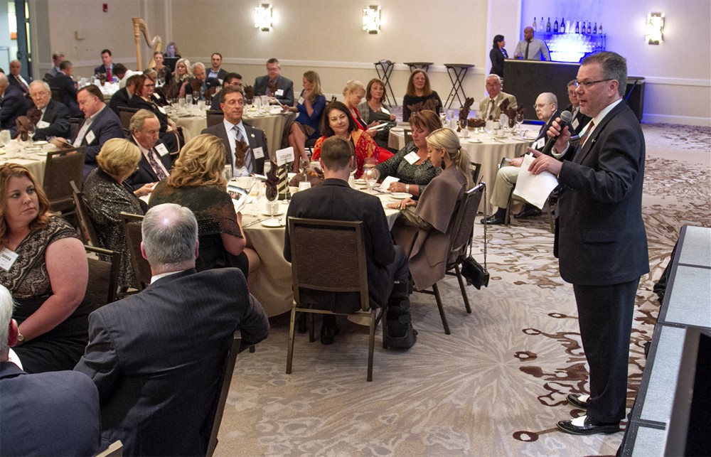 Co-Founder and Executive Director Rick Barlow addresses attendees before the dinner.