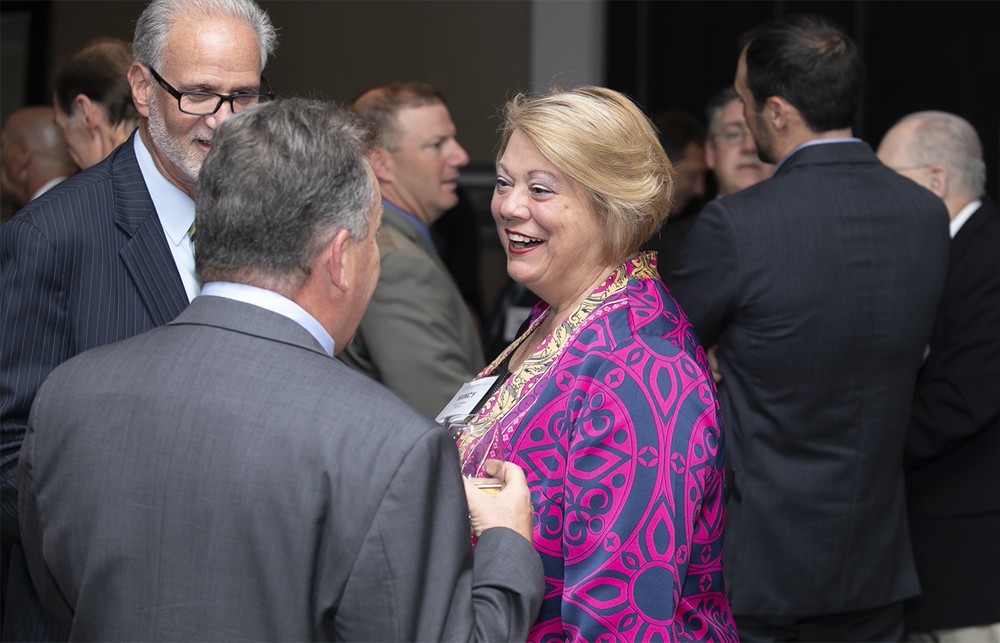 Nancy Pakieser (right) with Dennis Orthman (back to camera) and Tom Lubotsky.
