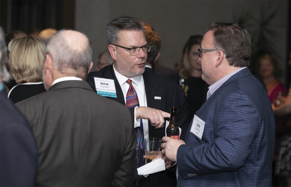 Bellwether League’s Rick Barlow with Piedmont’s Joe Colonna (right).
