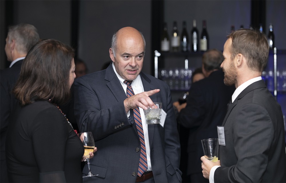 Bellwether League’s Ed Hisscock (center) with TractManager’s Maura Connor (left) and SMI’s Barry Blake (right).