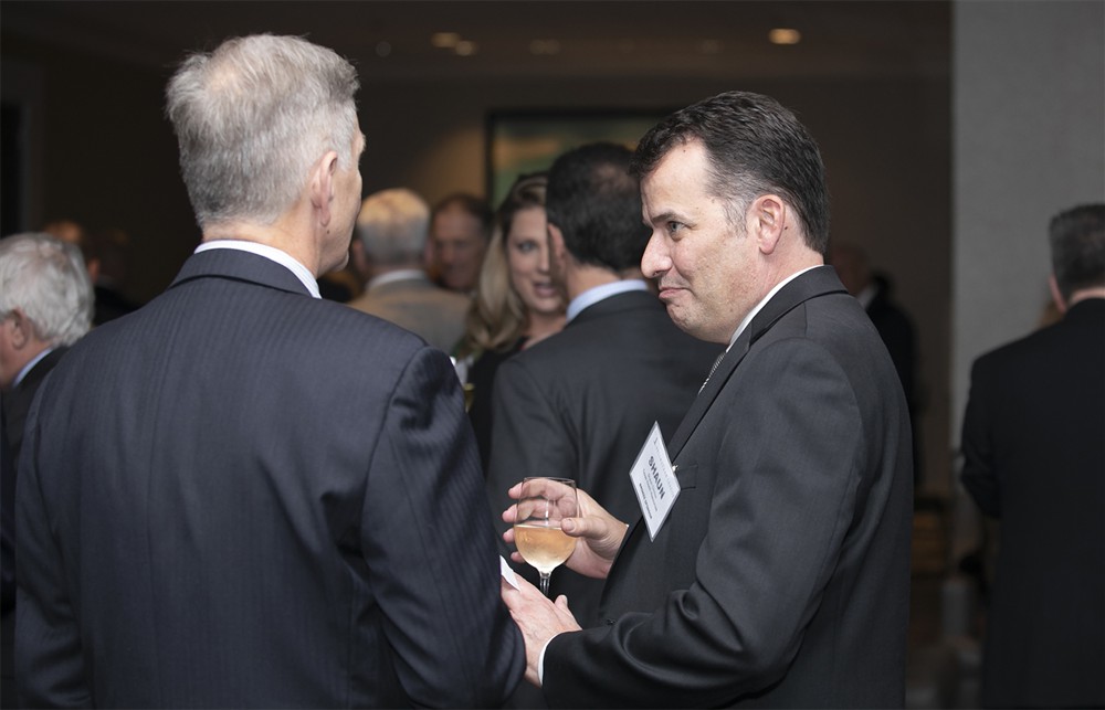 Texas Health Resources’ Shaun Clinton (Bronze Sustaining Sponsor) (right) and Presence Health’s Jacob Groenewold (left, back to camera).
