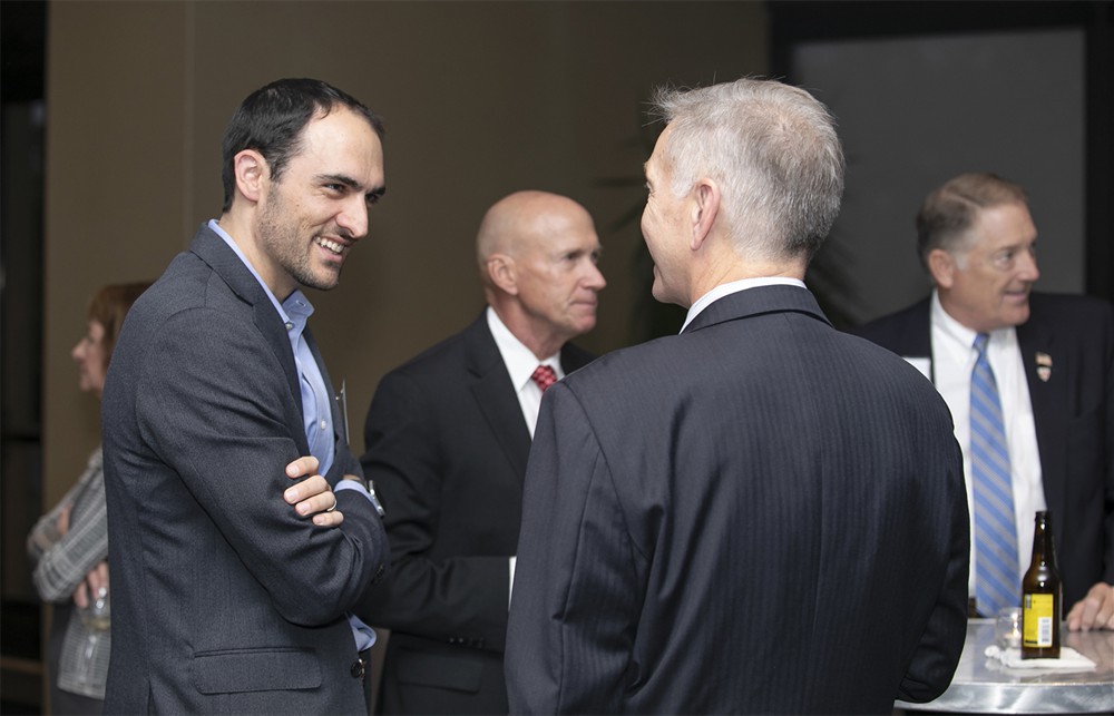 UChicago’s Eric Tritsch (Future Famers Class of 2015) (left) with Presence Health’s Jacob Groenewold (right, back to camera).