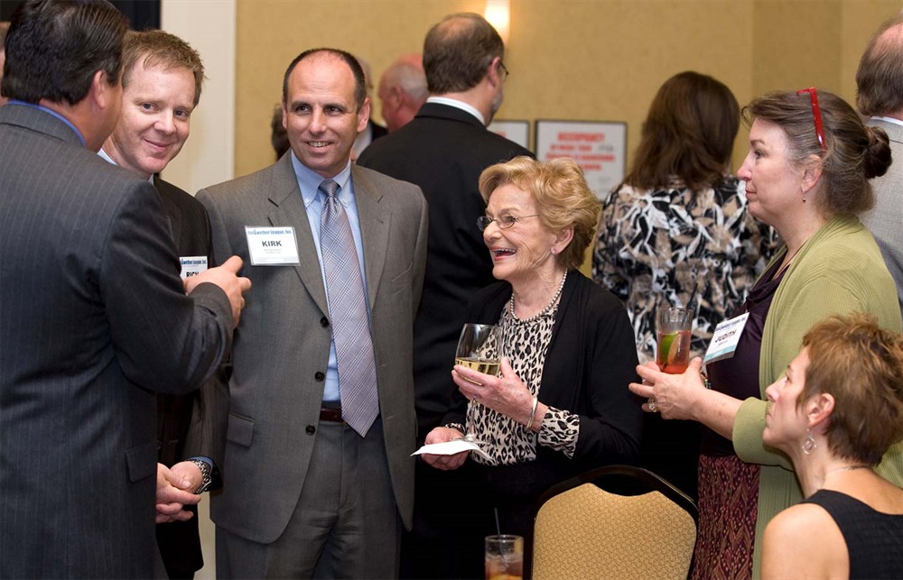 STERIS Corp.’s Rich Schaeffer (left) and Kirk Richardson (center), Phyllis Soth (wife of Bellwether Class of 2010 Honoree Don Soth) and daughters Judith Soth and Susan Soth (seated).