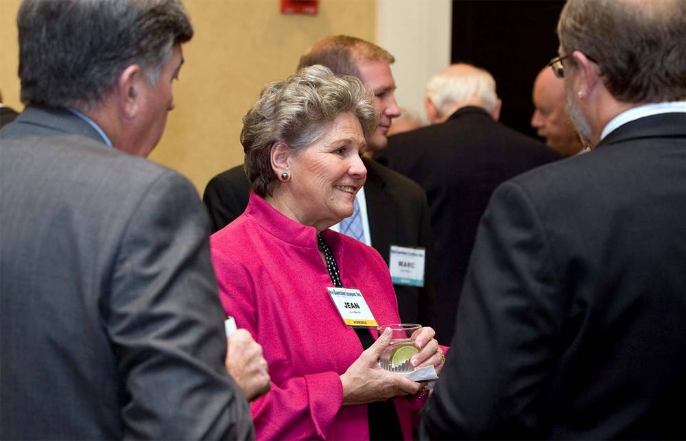 Jean Majors with son Marc Majors (background) mingles with friends of husband and Bellwether Class of 2010 Honoree Bob Majors during the VIP reception.