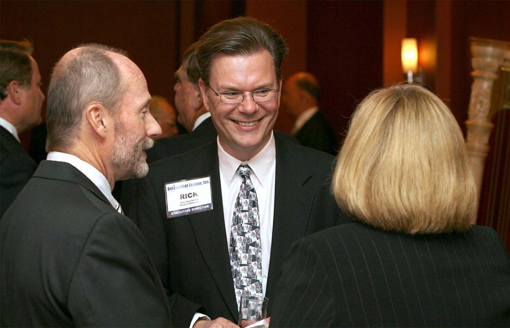 BLI Co-Founder and Chairman Jamie C. Kowalski with BLI Co-Founder and Executive Director Rick Dana Barlow chatting with Judy Stowell from Charter Sponsor GHX