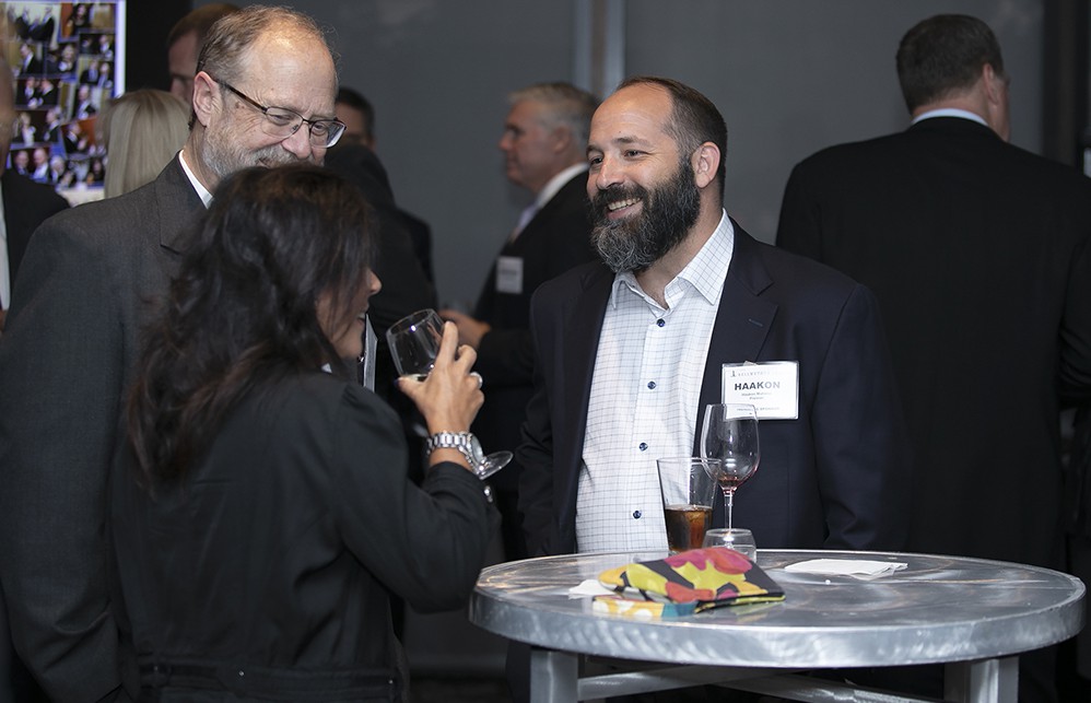 Founding Sustaining Sponsor Premier’s Haakon Midness (right) with AMITA Health’s David Wood and Premier’s Martine Aversa.