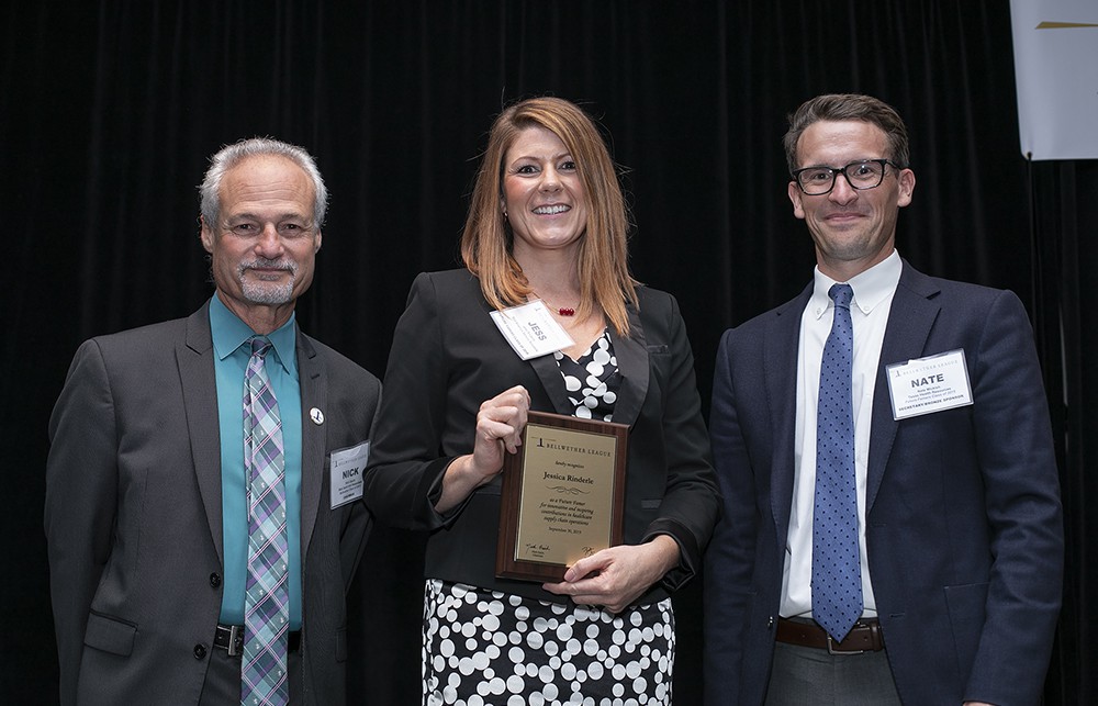 Mid-America Service Solutions’ Jessica Rinderle (Future Famers Class of 2019) with Nick Gaich and Nate Mickish.