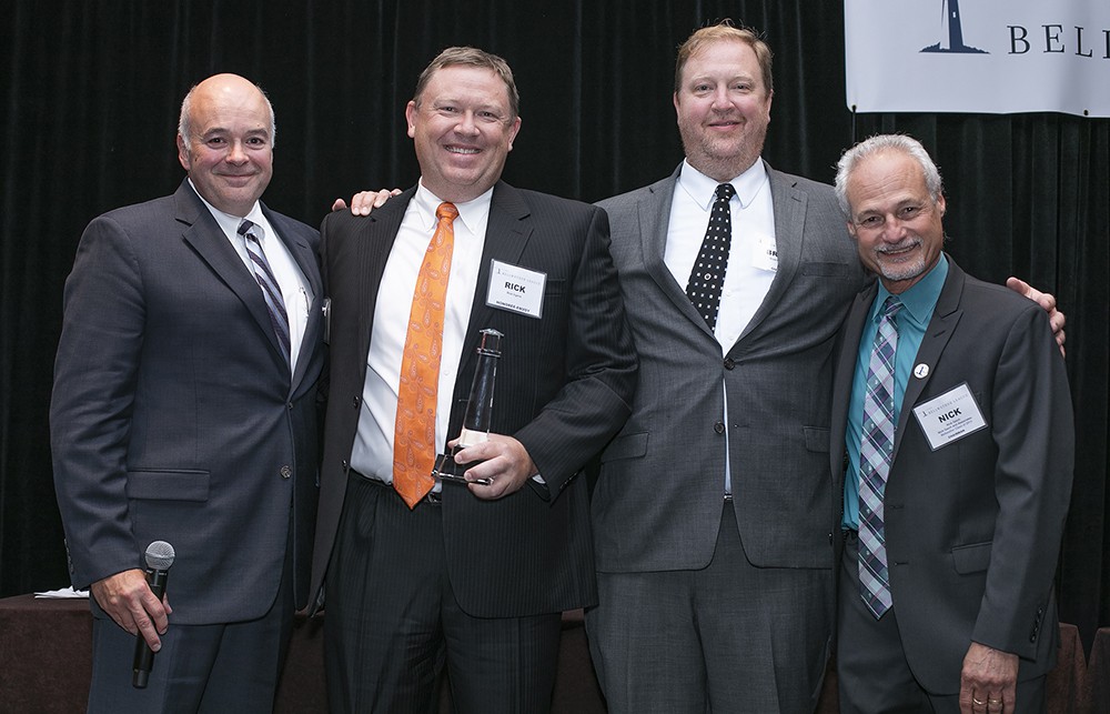 Rick Irgens and Brad Irgens, sons of Capt. Terry Irgens, are flanked by Ed Hisscock and Nick Gaich.