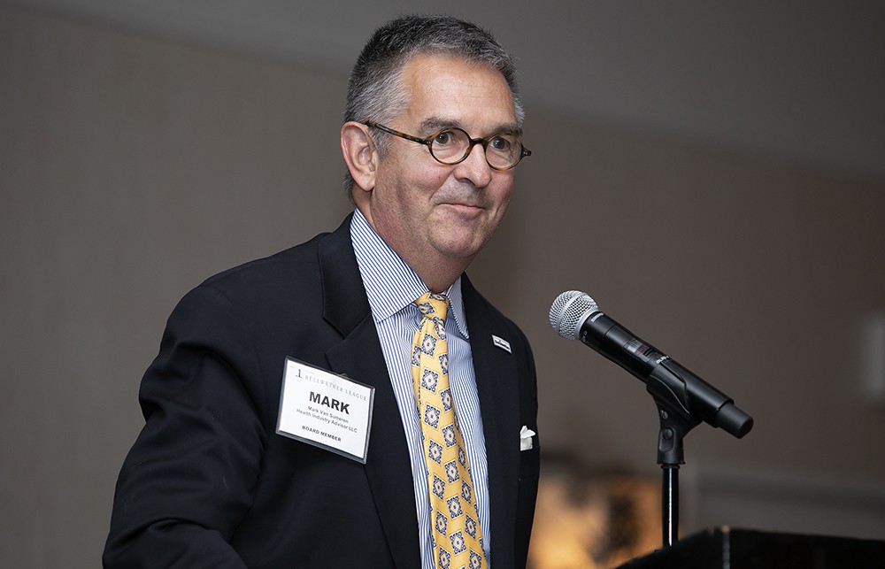 Bellwether League Board Member Mark Van Sumeren introduces the final 2019 Honoree Larry Smith.