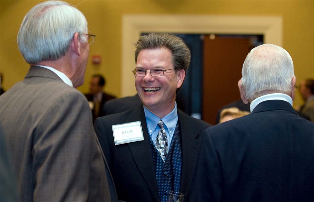 Rick Barlow jokes with Bellwether Class of 2008’s Lee Boergadine (left) and Bellwether Class of 2009’s Sam Raudenbush (right).