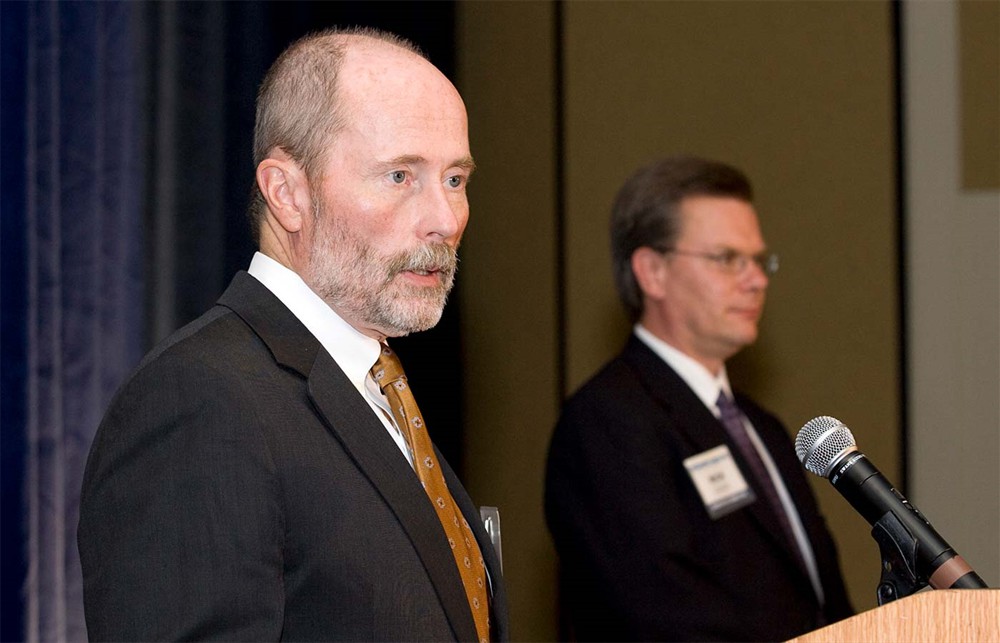 Chairman Jamie Kowalski and Executive Director Rick Dana Barlow acknowledge retiring Founding Board Members James F. Dickow and Treasurer Patrick E. Carroll Jr.