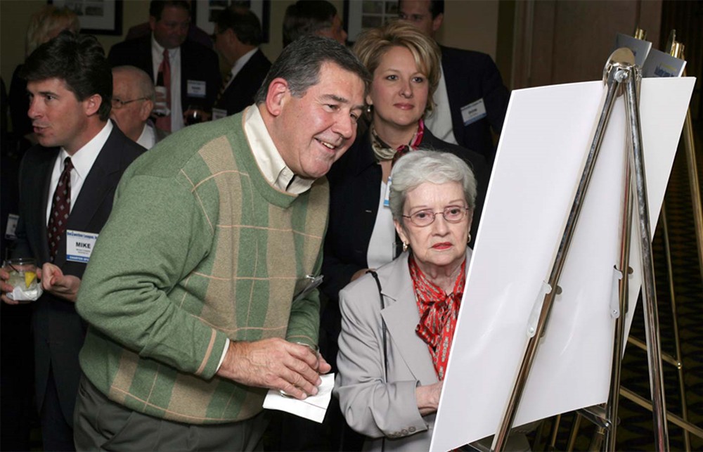 Board Member Laurence A. Dickson with Jamie Burton, wife of Inductee Gene Burton