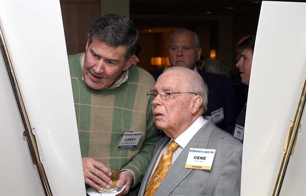 Inductee Gene Burton and Laurence A. Dickson discuss the displays