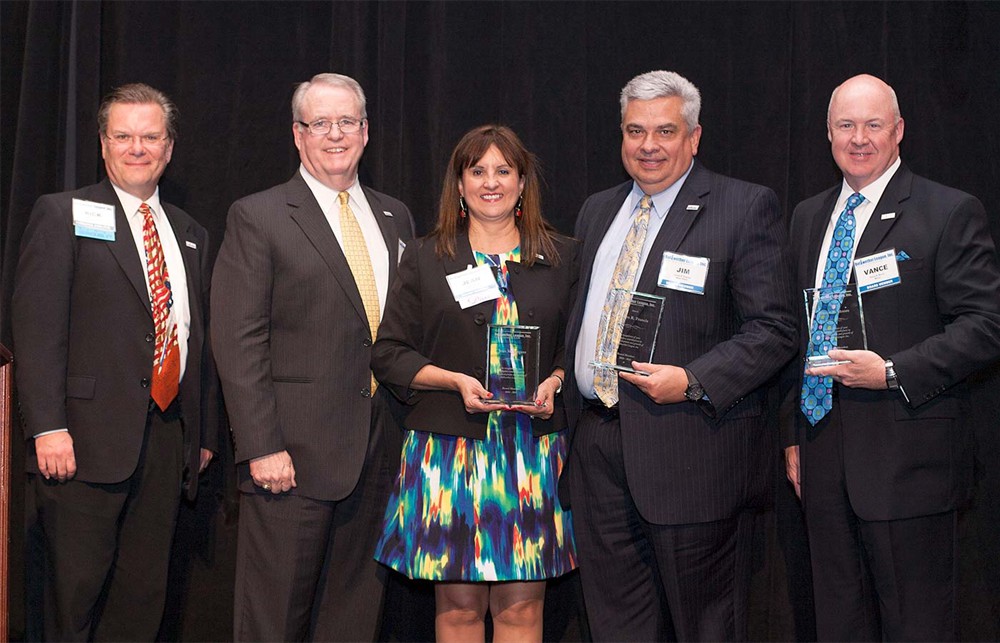 Bellwether League’s Rick Barlow and John Gaida (left to right) salute retiring Board Members Jean Sargent, Jim Francis and Vance Moore.