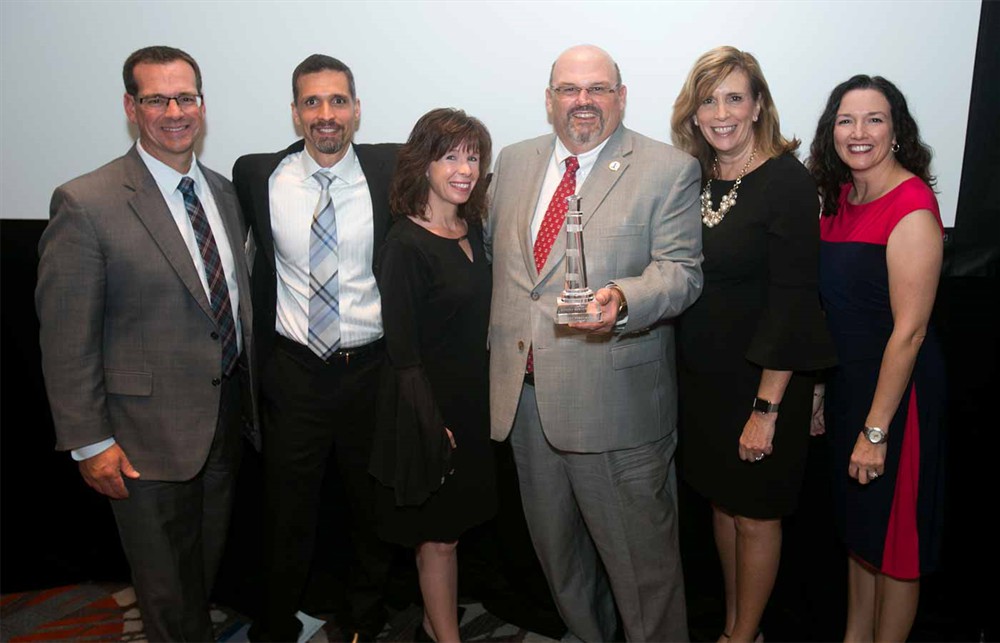 The Yankee Alliance team: (L to R): Blue.Point’s Mark Scagliarini, John Vlahopoulos, Melanie Kawiecki, Bellwether Class of 2017 Inductee Jim Oliver, Cathy Spinney and Amy Campbell.